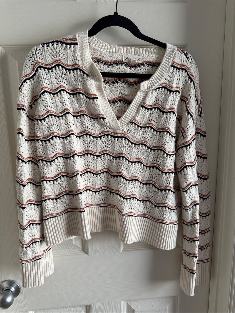 Marled Cream Open-Knit V-Neck Sweater with Black and Rust Stripes